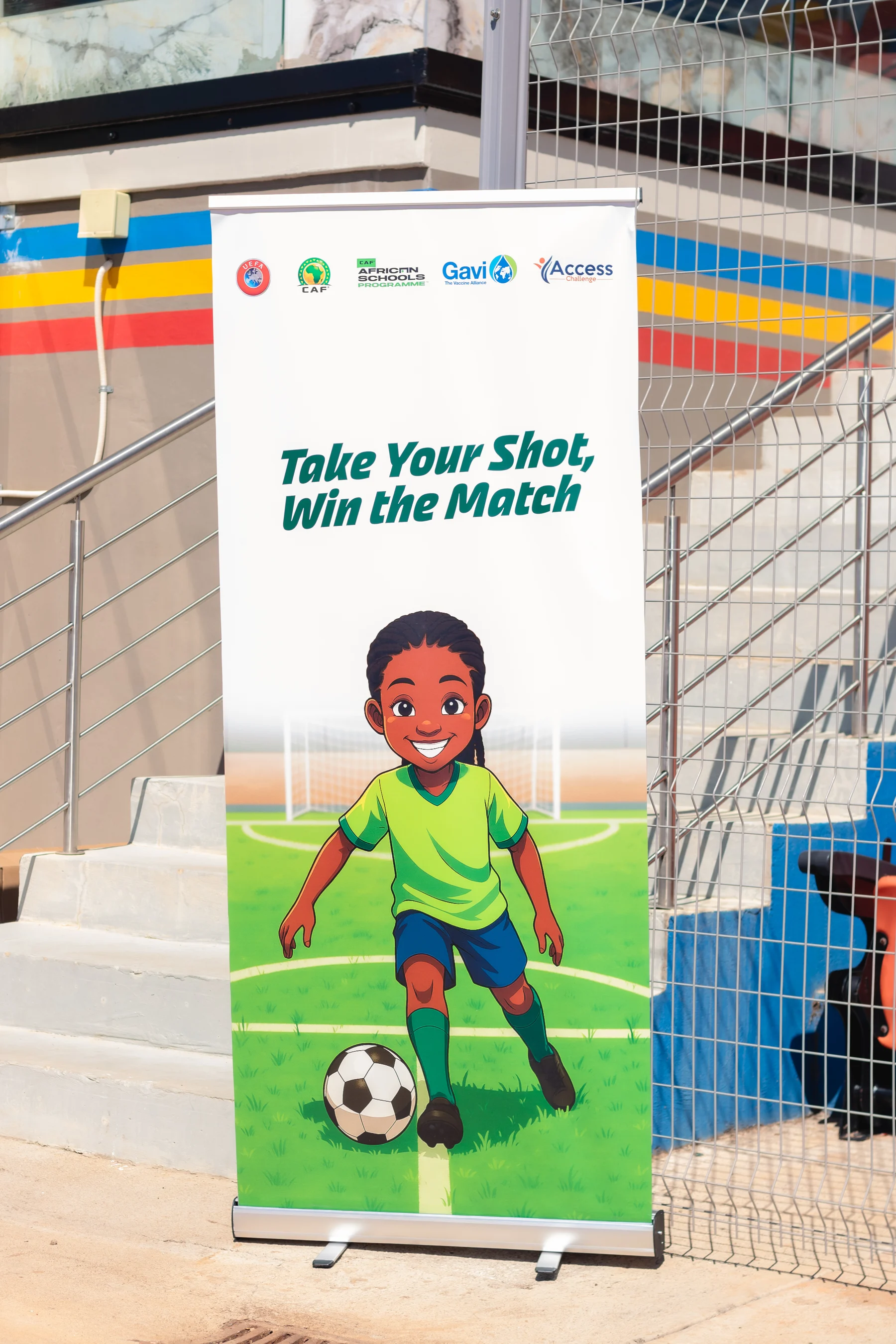 The campaign banner displayed beside the sports area